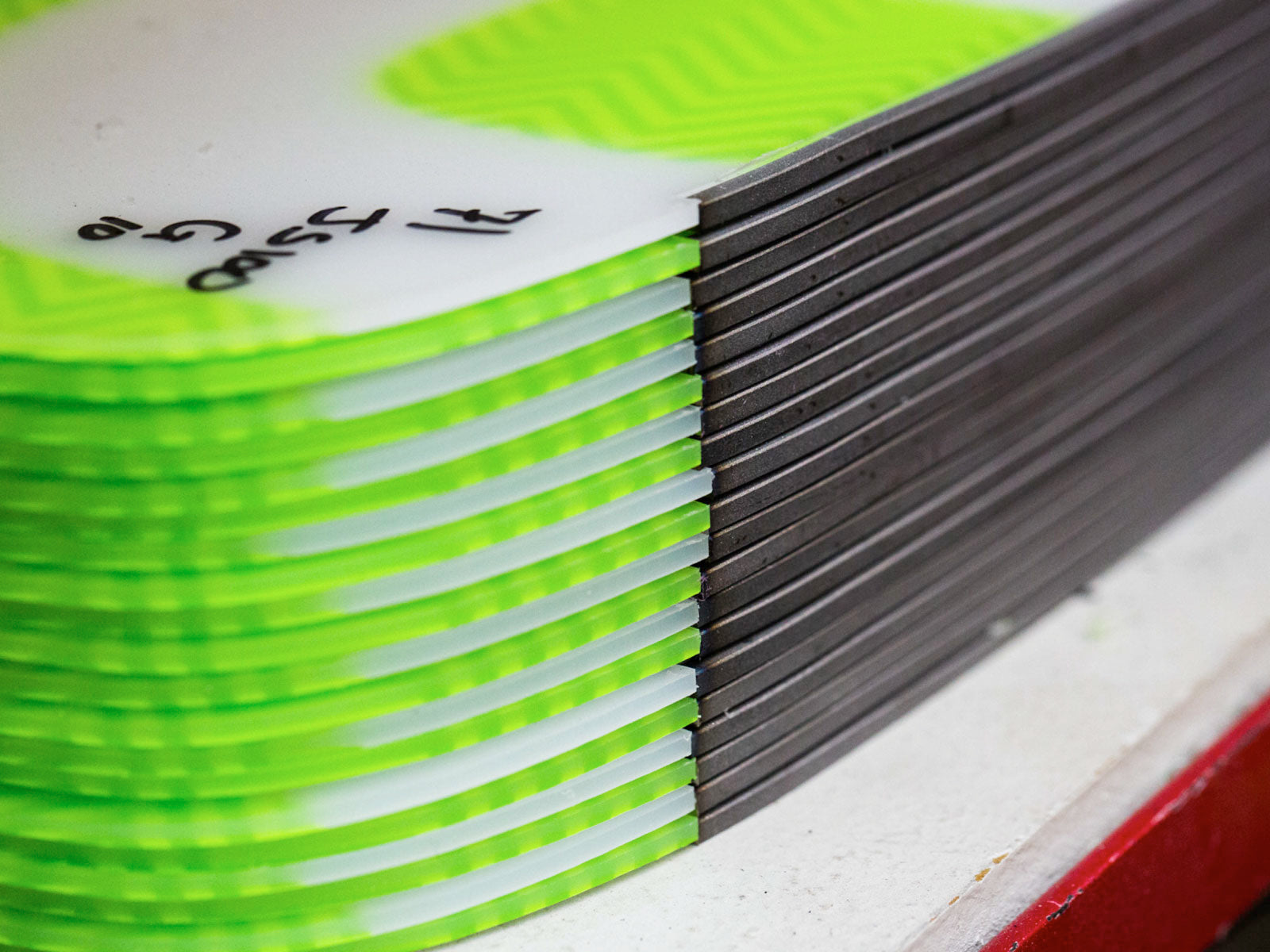 A sheet of 1.8mm black sintered base material before cutting.